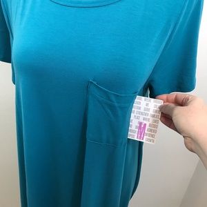 New with tag solid teal Carly